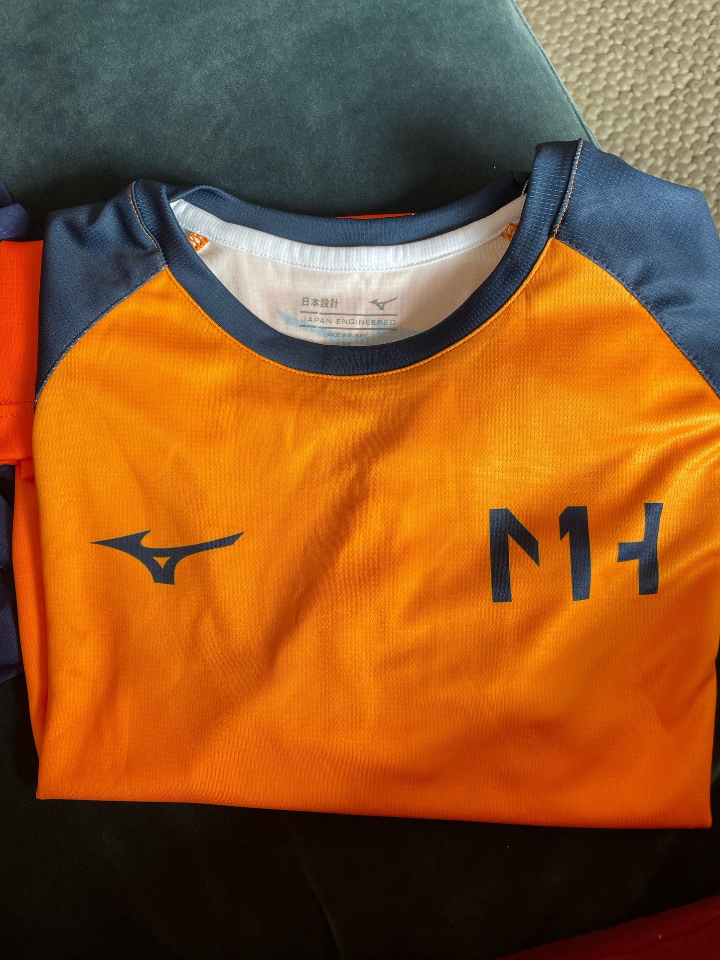 MH1 Orange Gradient Performance tee